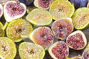 Background of ripe purple and yellow fig fruits