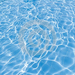 Background of rippled pattern of clean water in a blue swimming