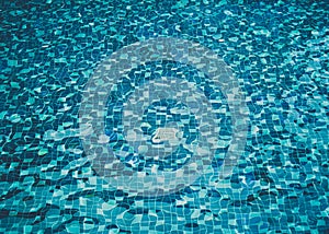 Background of rippled water in swimming pool