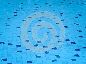 Background of rippled water in swimming pool