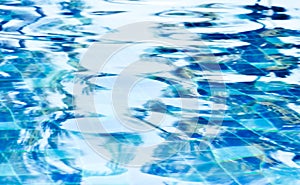 Background of rippled water in swimming pool