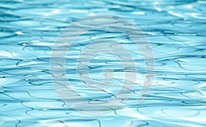 Background of rippled water in swimming pool