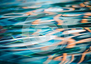 Background of rippled water in swimming pool