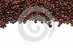 Background of roasted brown coffee beans. coffee texture or abstraction for a menu background, ad, or illustration. a handful of