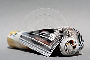 Background Rolledup magazine