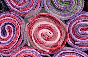 Background of rolls of cloth and felt for sale