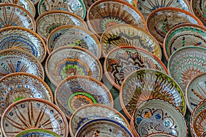 Background with Romanian traditional ceramic in the plates form