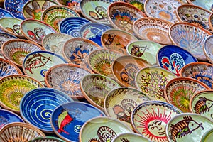 Background with Romanian traditional ceramic in the plates form