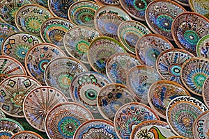 Background with Romanian traditional ceramic in the plates form