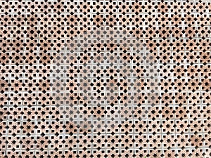 The background of the roster wall has an Islamic art motif