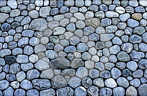 Background of rounded gray stones, pebbles, copy space