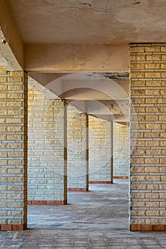 Background of row of sequential stone brick columns