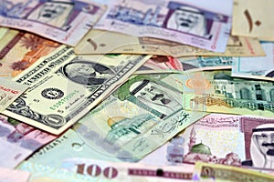 Background of Saudi Arabia riyals money banknotes bill and United States Of America dollars notes, American and Saudi money