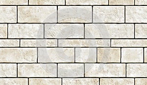 The background is a seamless texture of rustic brown stone wall
