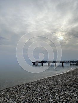 background, seascape - the sea in the distance merges with the sky in the morning mist