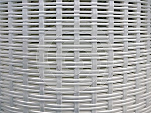 The background of semicircular baskets made of white plastic, texture