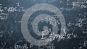 Background shot of blackboard with scientific and algebraic formulas and graphs written on it in graphics. Business photo