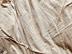 Background Shows Sculptural Wrinkles in an Off White Drop Cloth