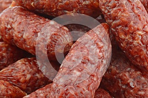 Background of small cervelat sausages