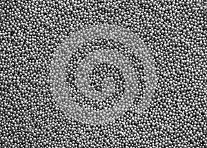 Background from small silver balls. Christmas background, festive background