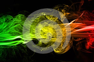 Background smoke curves and wave reggae colors green, yellow, red colored in flag of reggae music