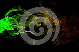 Background smoke curves and wave reggae colors green, yellow, red colored in flag of reggae music
