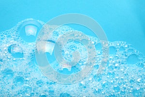 Background soap suds foam and bubbles from detergent. House cleaning concept photo