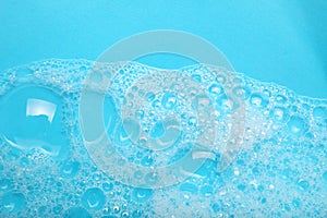 Background soap suds foam and bubbles from detergent. House cleaning concept