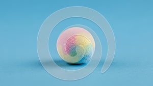 The background is a solid light blue complementing the colors on