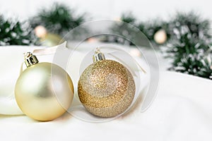Background with spheres and tree ornament with Christmas lights.