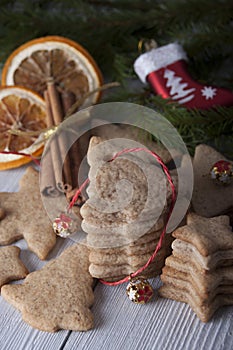 Background with a stack of ginger biscuits and Christmas decor