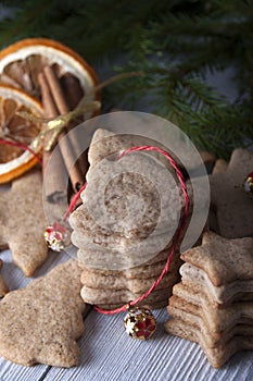 Background with a stack of ginger biscuits and Christmas decor
