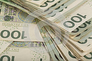 Background. Stack of Polish 100 zloty banknotes.