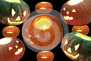 Background-still life made up of glowing Halloween pumpkins of different sizes and colors