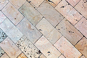 Background of stone floor made of rectangular shiny smooth slabs