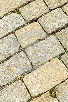 Background stone gray paving stone hard surface part of city square close-up background urban