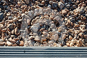 Background of stones from the English Channel beach. Abstraction
