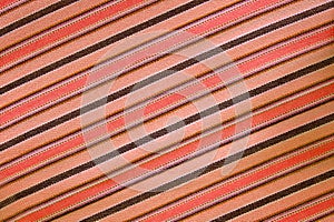 Background striped orange fabric. Texture patterns materials. Te