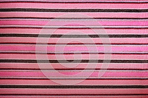 Background striped pink fabric. Texture patterns materials.