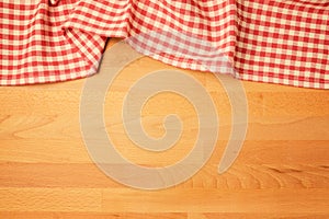 Background with tablecloth on wooden rustic counter.