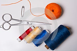 Background for tailor multicolored threads and scissors
