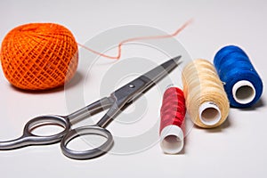Background for tailor multicolored threads and scissors