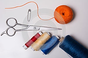 Background for tailor multicolored threads and scissors