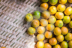 Background of tangerine in Thai basket