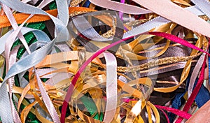 Background tangled with colorful ribbons.