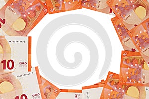 Background of ten euros notes spread out in a circle