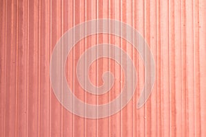 Background texture gradations on pink plastic