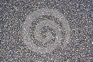 Background texture of asphalt shot from above in close-up