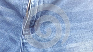 Background texture of blue jeans in blur. fabric