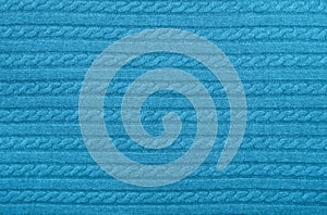 Background texture of blue knitted wool fabric